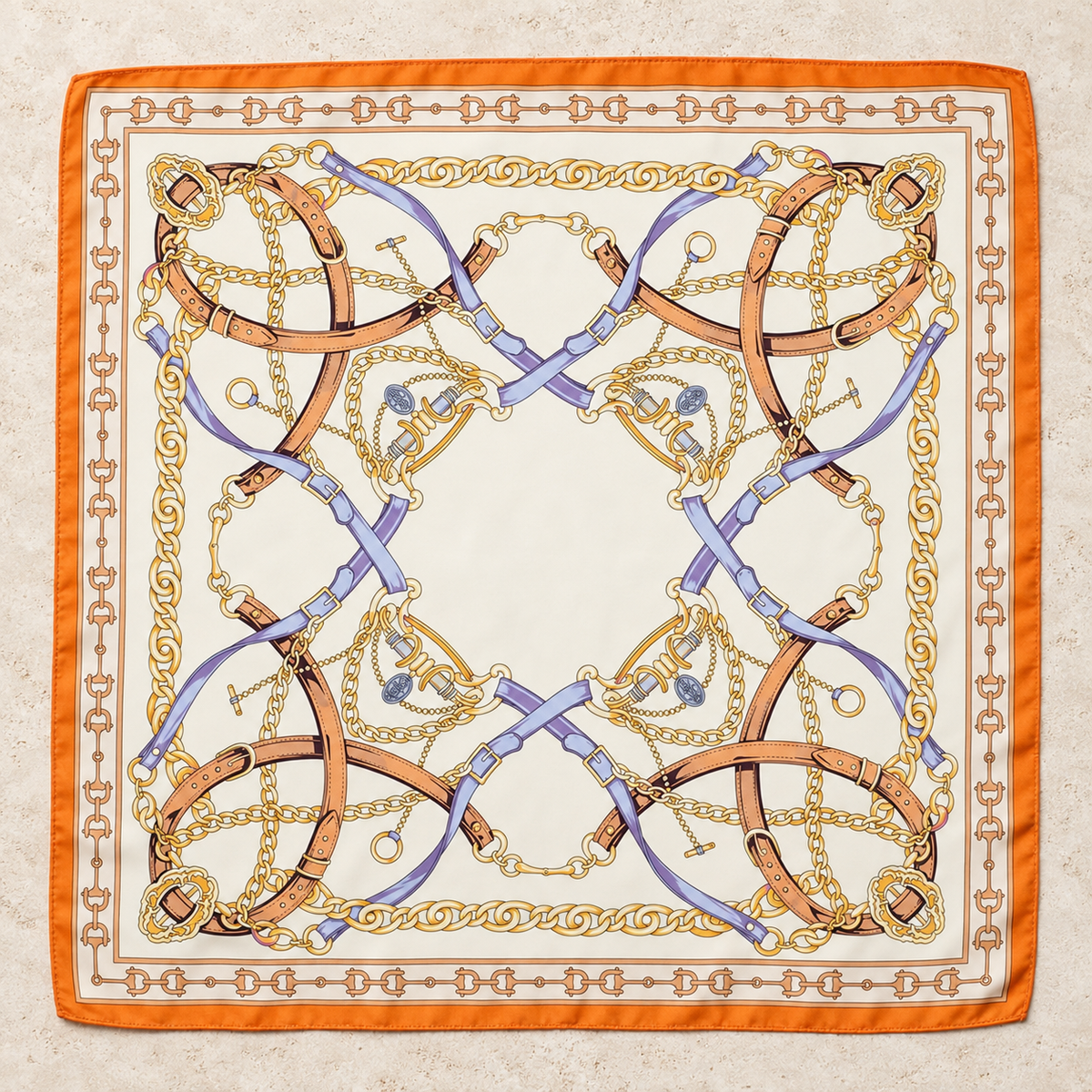 Orange Border Saddle Society scarf worn at the neck with a cream blazer beside a coastal marina.