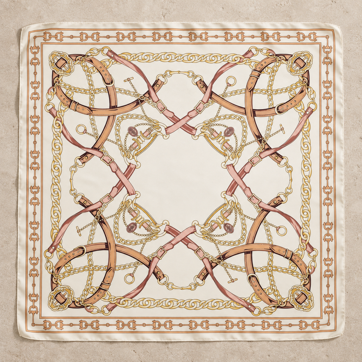 Ivory Saddle Society equestrian square scarf displayed flat on warm taupe stone.