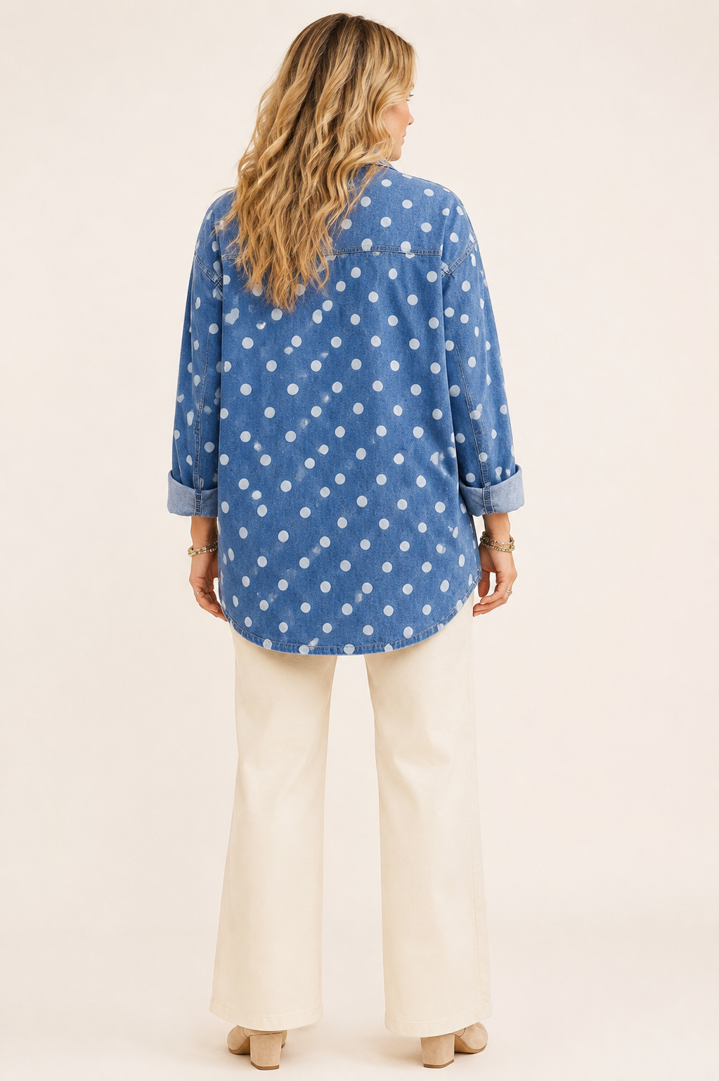 Back view of the Bluebell polka-dot denim shacket showing its relaxed fit, dropped shoulders and rounded hem.