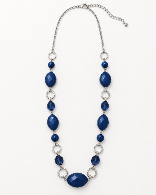 Blue Hour statement necklace with deep blue faceted beads, textured silver-tone rings and adjustable chain