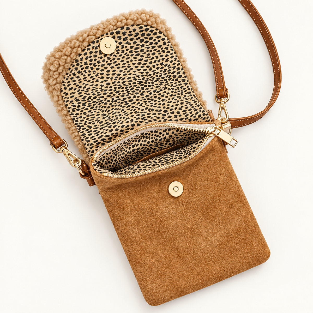 Open Teddy Brown phone crossbody bag showing animal-print lining, zipper, and magnetic closure