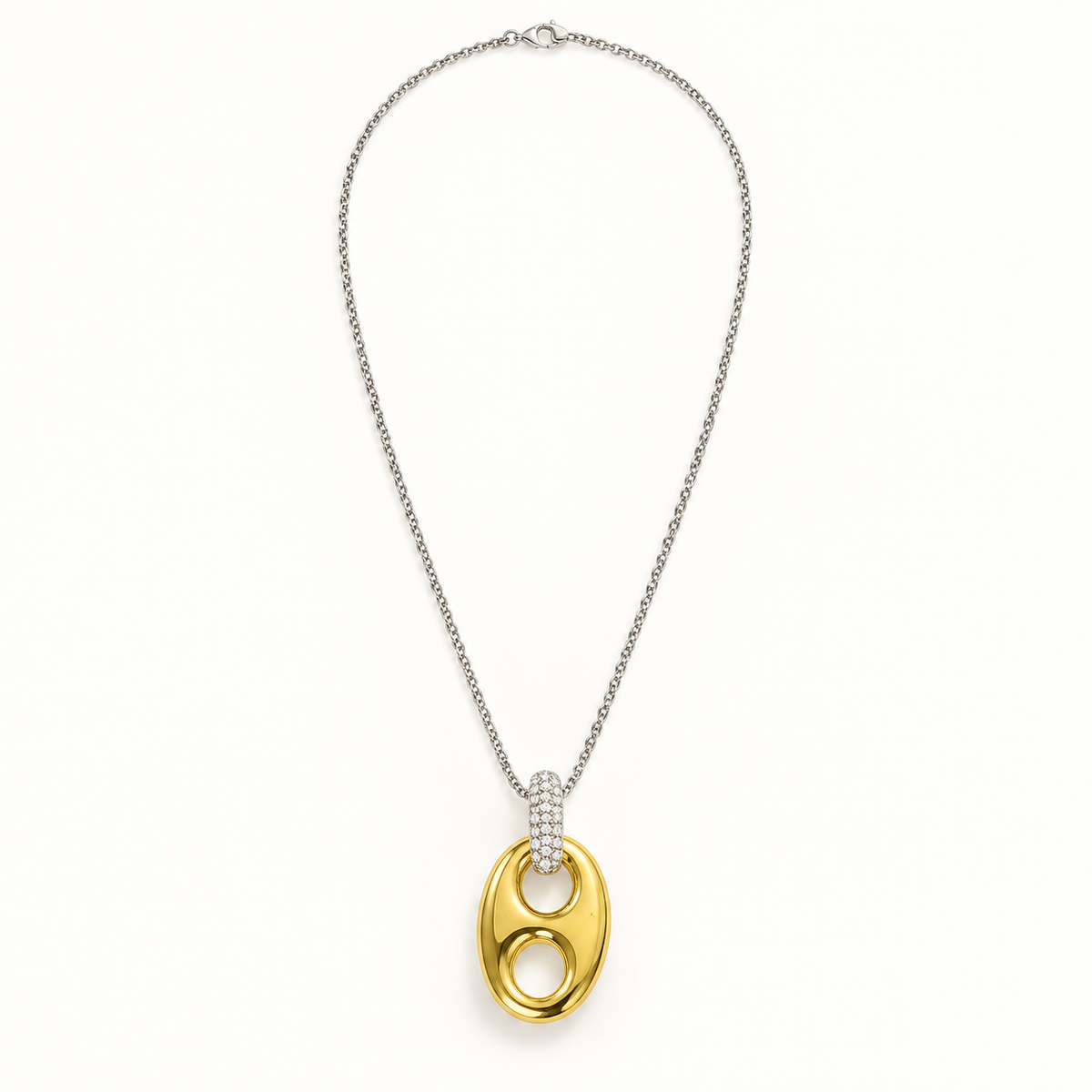 Golden Reins two-tone horse bit pendant necklace on a warm-white background