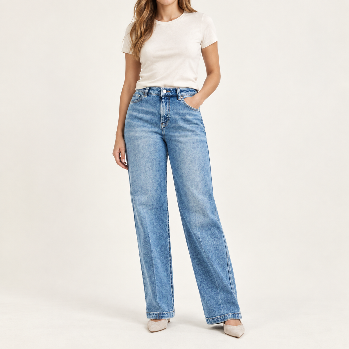 Front view of RISEN Easy Street slouchy straight jeans styled with an ivory T-shirt and neutral heels.