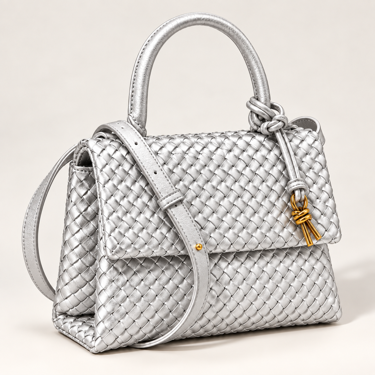 Silver Sutton woven structured handbag with metallic finish, top handle and gold-tone decorative hardware