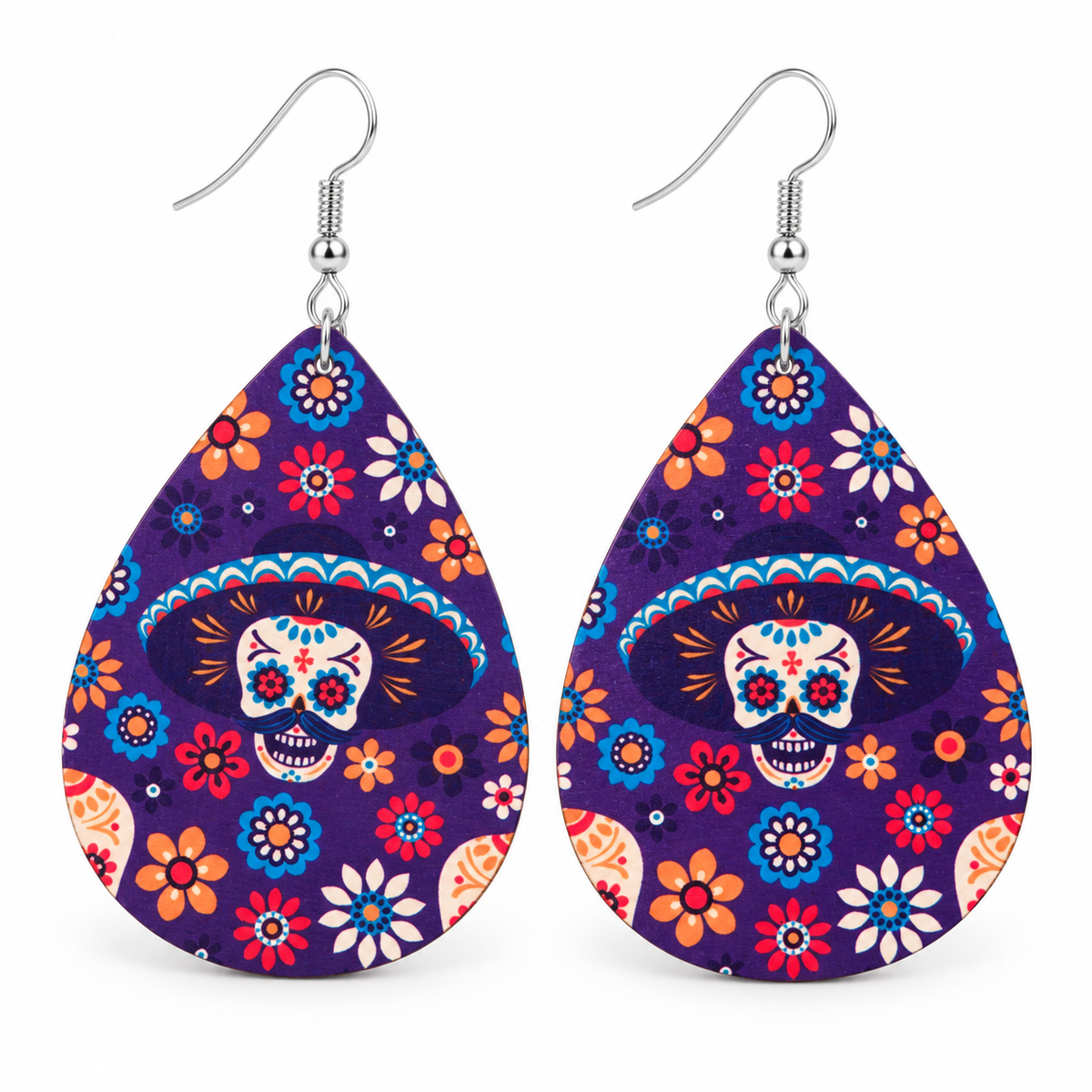 Midnight Fiesta wood teardrop earrings with colorful sugar skull and floral print on a white background