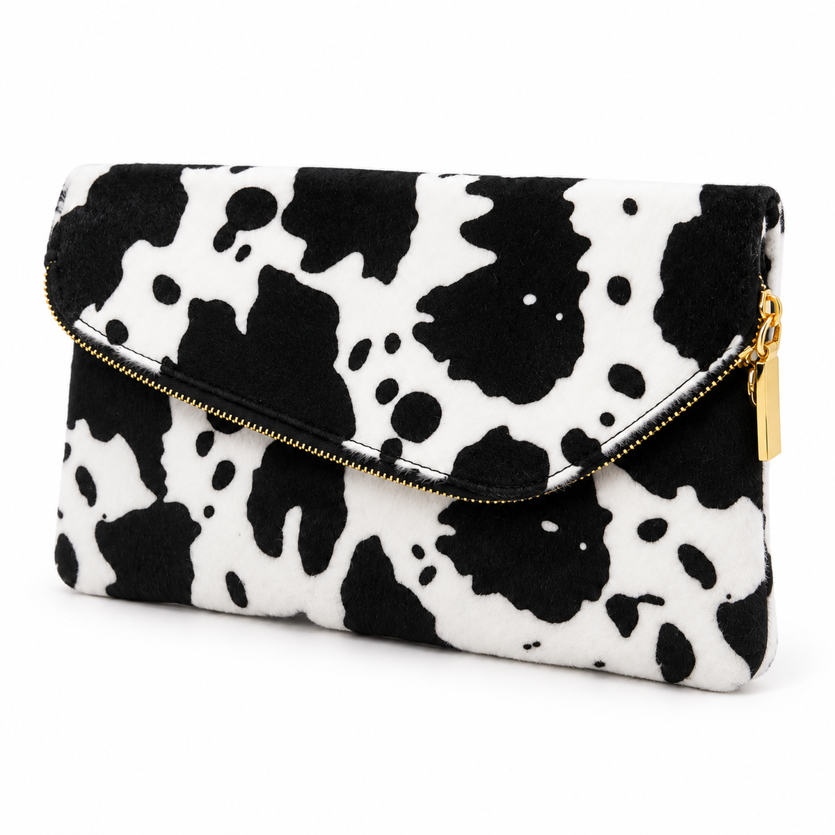Back view of black and white cow print clutch with gold exterior zipper pocket