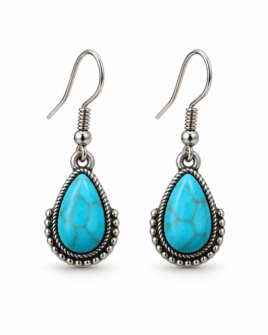 Mesa Sky faux turquoise teardrop earrings with antiqued silver-tone rope and bead detailing on a white background