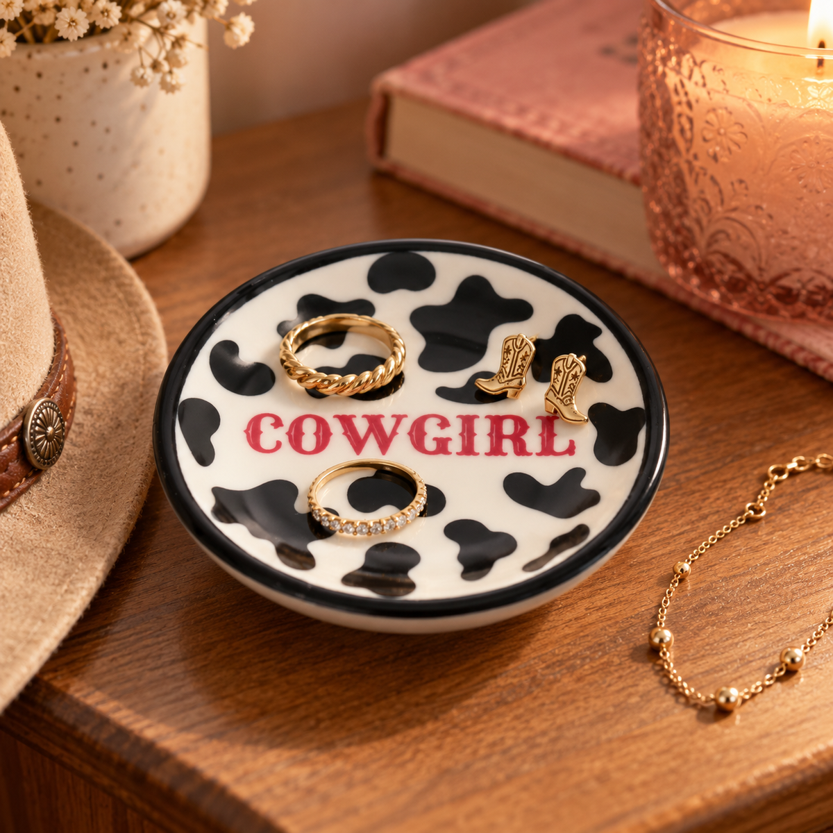 Side view of Cowprint Cowgirl western jewelry ring dish showing shallow ceramic design