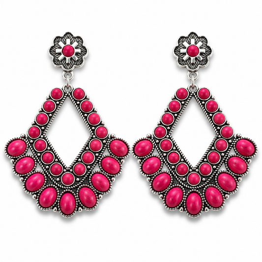 Rodeo Rose pink stone statement earrings with silver-tone western concho posts on white background