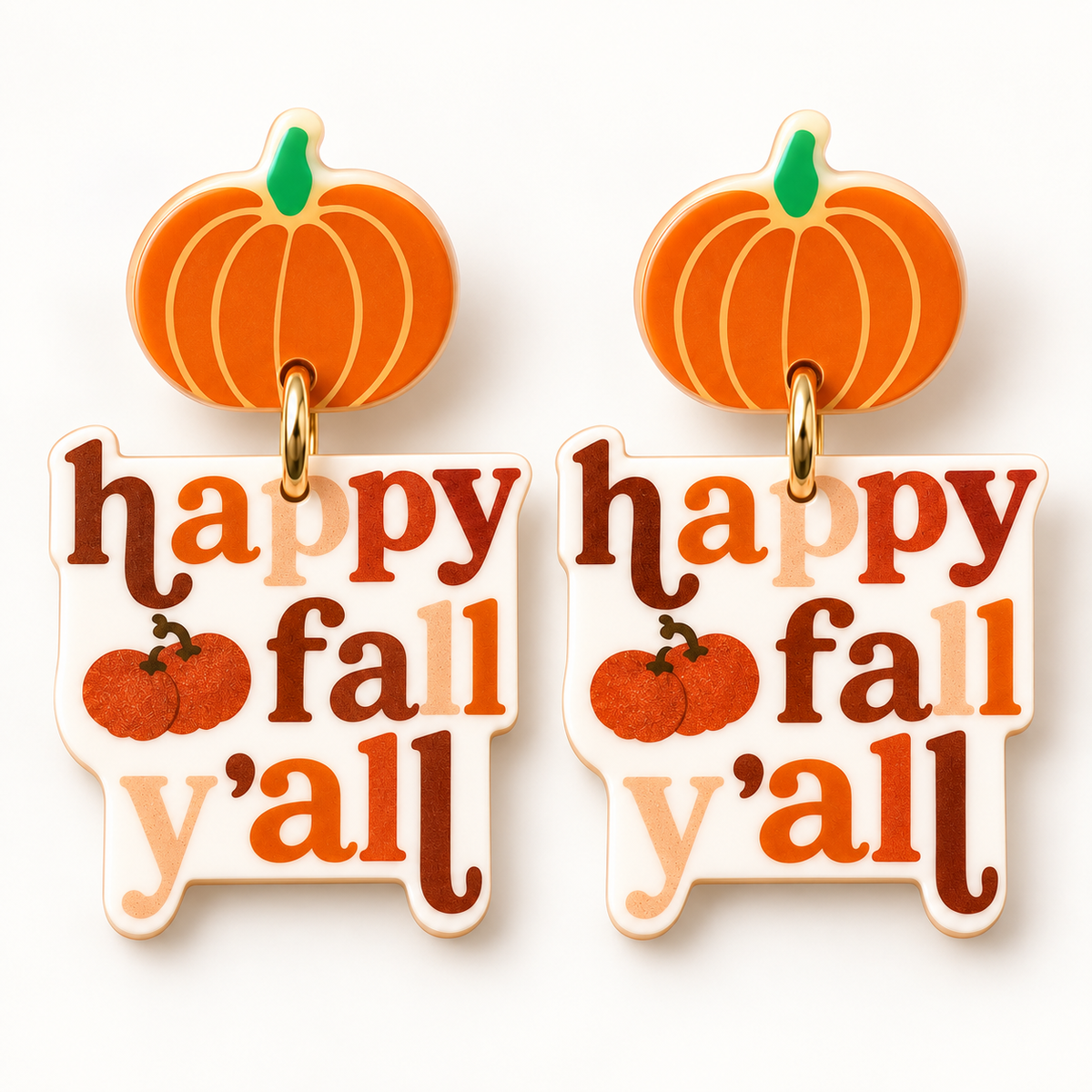 Close-up of Happy Fall Y’all acrylic earrings with orange pumpkin topper and warm fall lettering