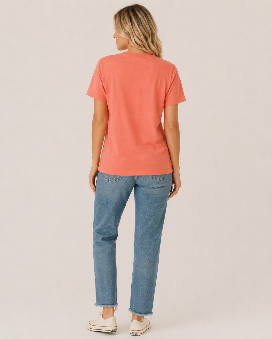 Back view of coral Trick or Treat Yo’Self short sleeve tee on bleach blonde model Emma