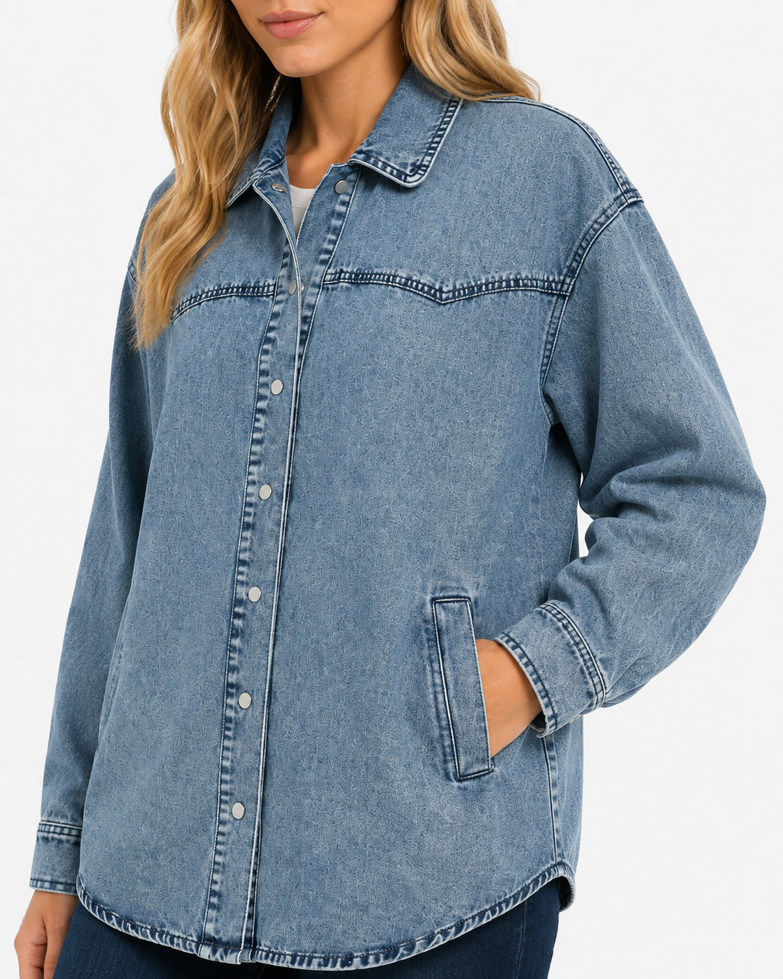 Close-up of the Dusk Blue Western Tunic Denim Jacket showing the washed denim texture, western yoke seams, snap buttons and angled front pocket.