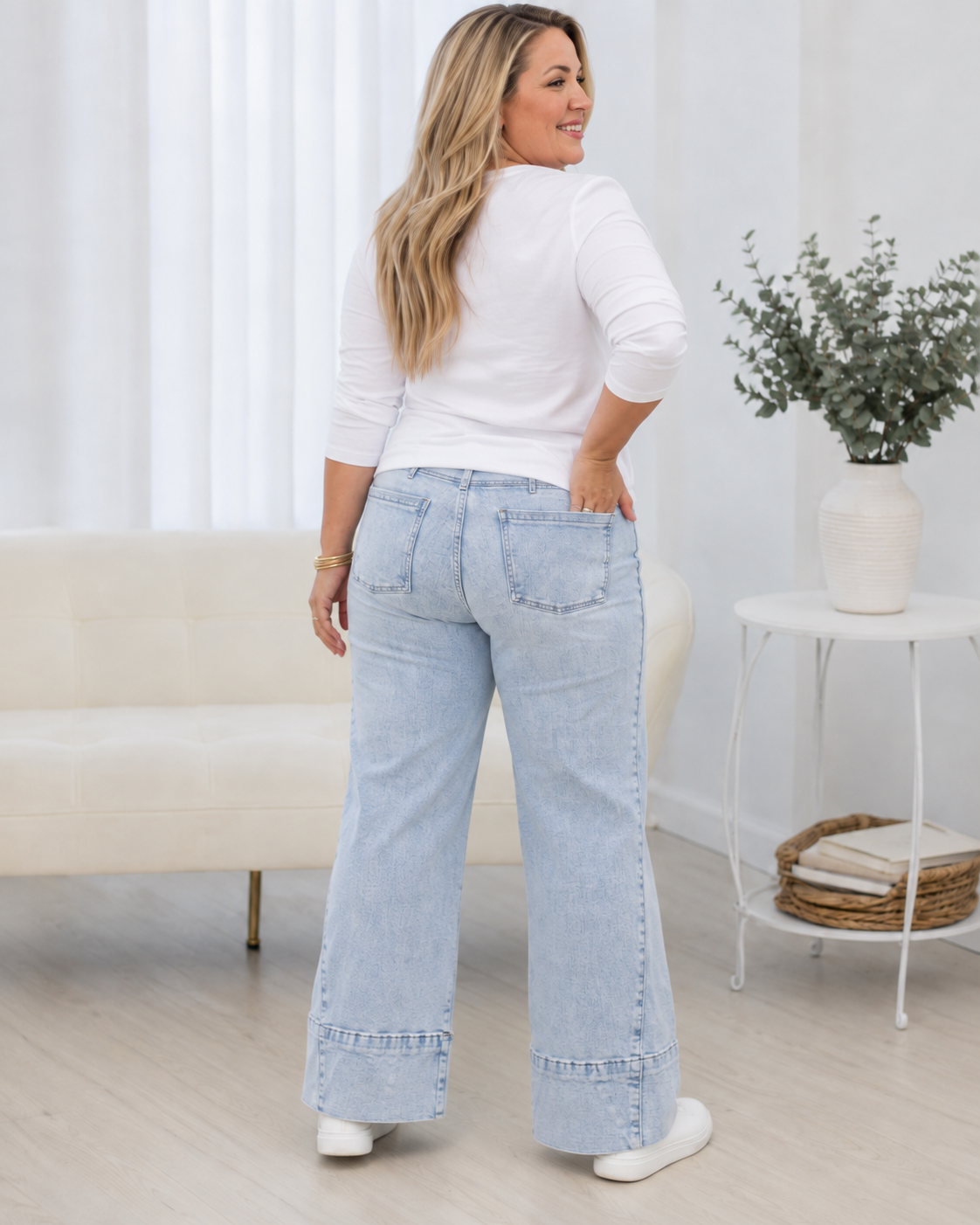 Back view of Beau Blue Seamed Wide-Leg Plus Size Jeans showing the relaxed fit, back pockets and wide finished hems.