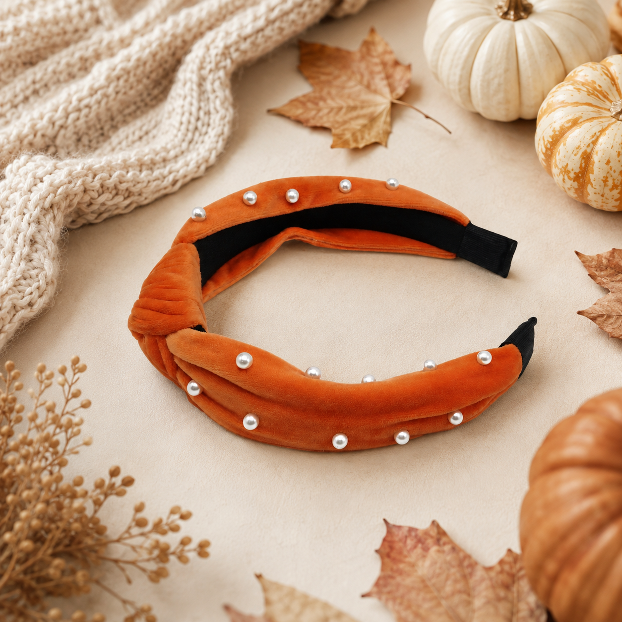 Burnt sienna velvet pearl headband styled with cream knit, pumpkins and autumn leaves