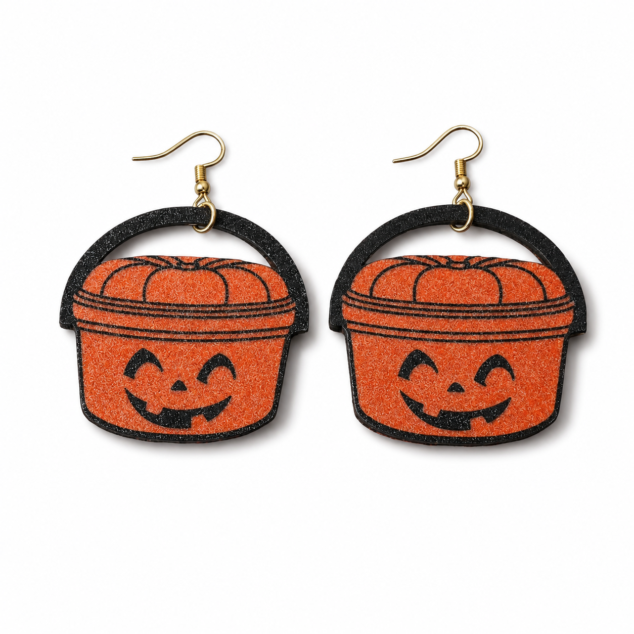 Trick-or-Treat Pumpkin Pail Dangle Earrings with orange jack-o’-lantern design and gold-tone hooks on white background.