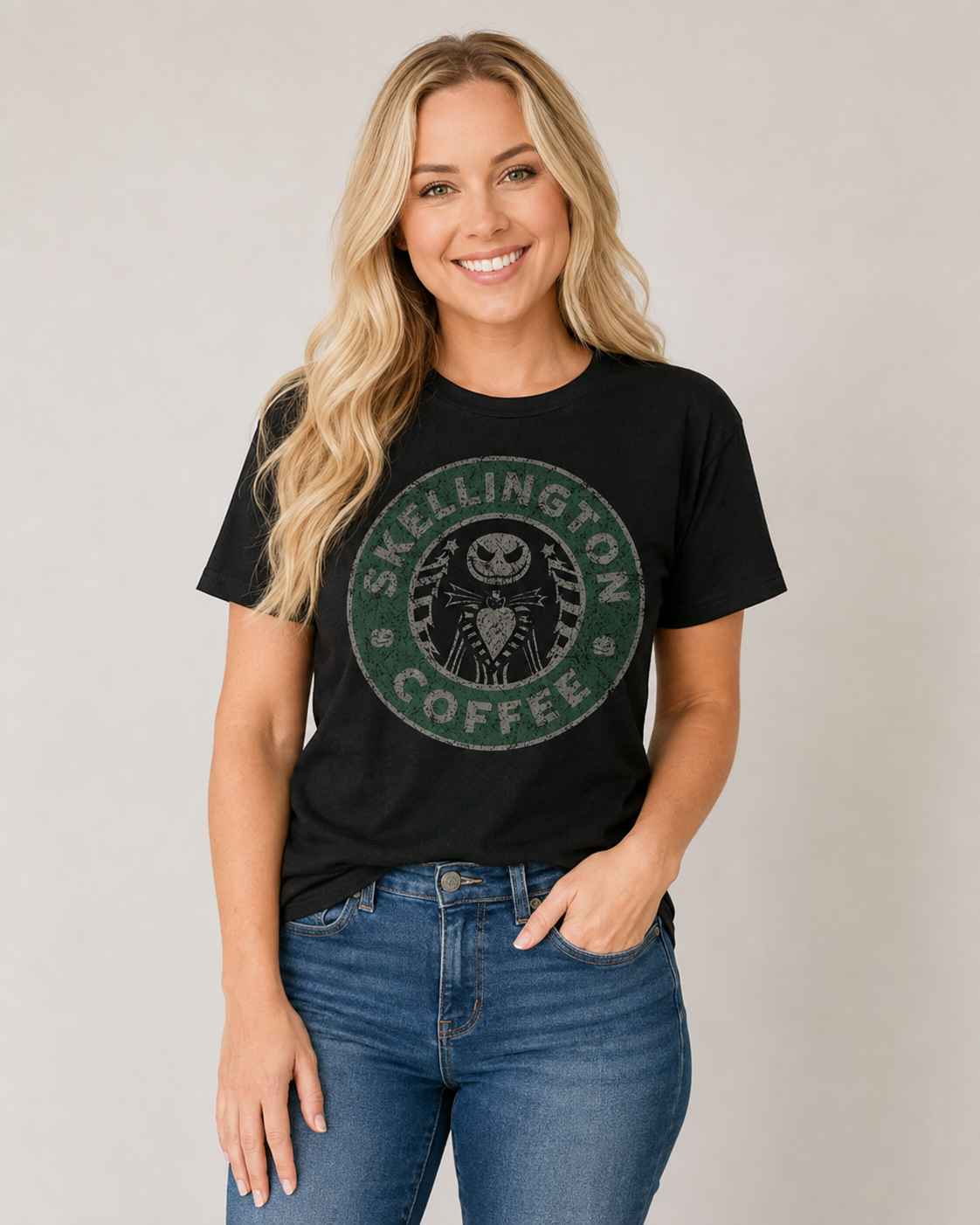 Skellington Coffee black graphic tee with distressed green skeleton coffeehouse design on bleach blonde model Emma