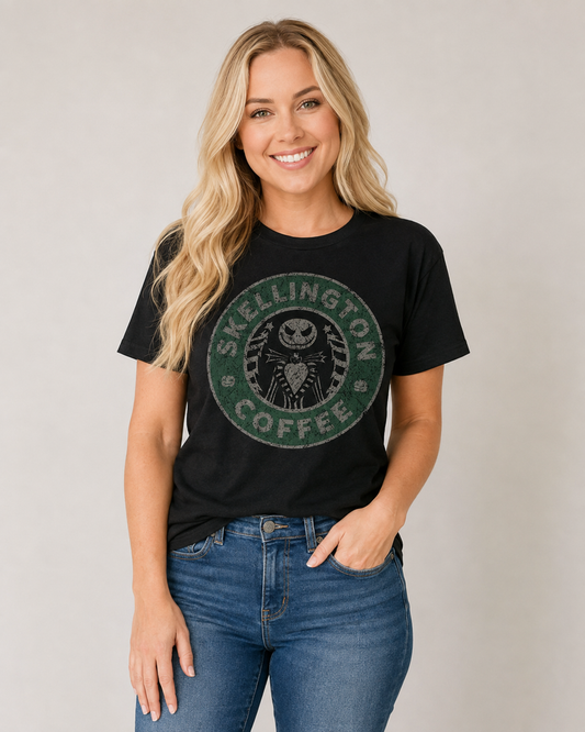 Skellington Coffee black graphic tee with distressed green skeleton coffeehouse design on bleach blonde model Emma