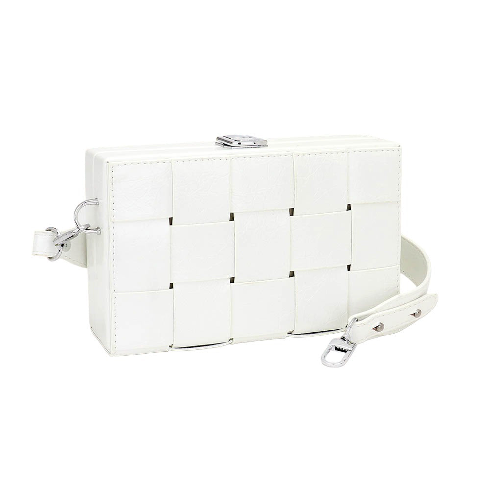 White quilted handbag with a strap on a white background