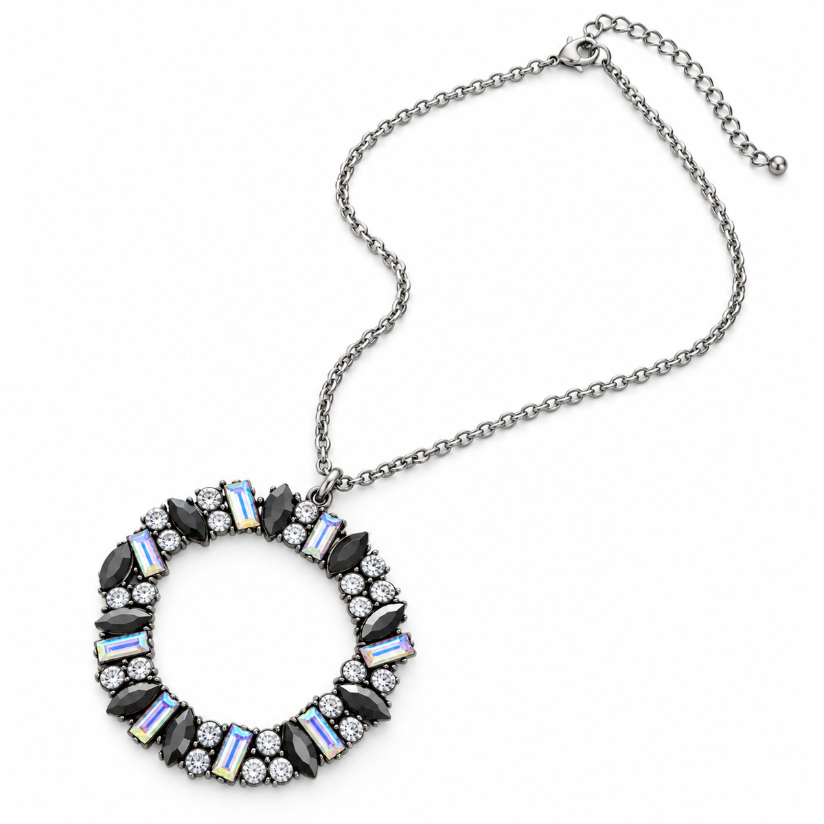 Iridescent crystal wreath pendant necklace with black marquise stones, clear rhinestones, and silver-tone chain on a white background