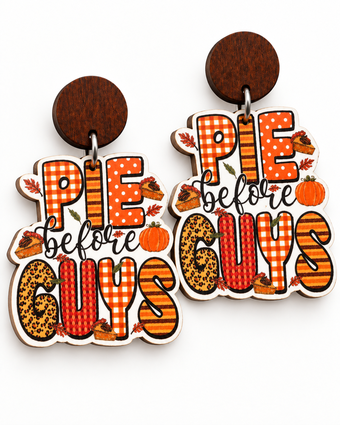 Close-up of Pie Before Guys wooden earrings with pumpkin, pie, plaid, and leopard print details