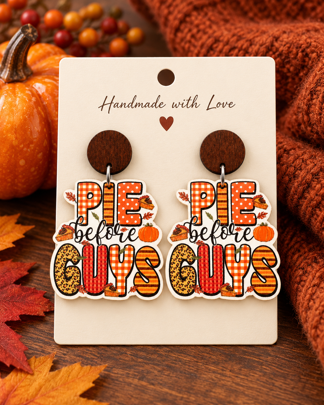 Pie Before Guys wooden fall earrings displayed on a seasonal jewelry card with pumpkin and sweater styling