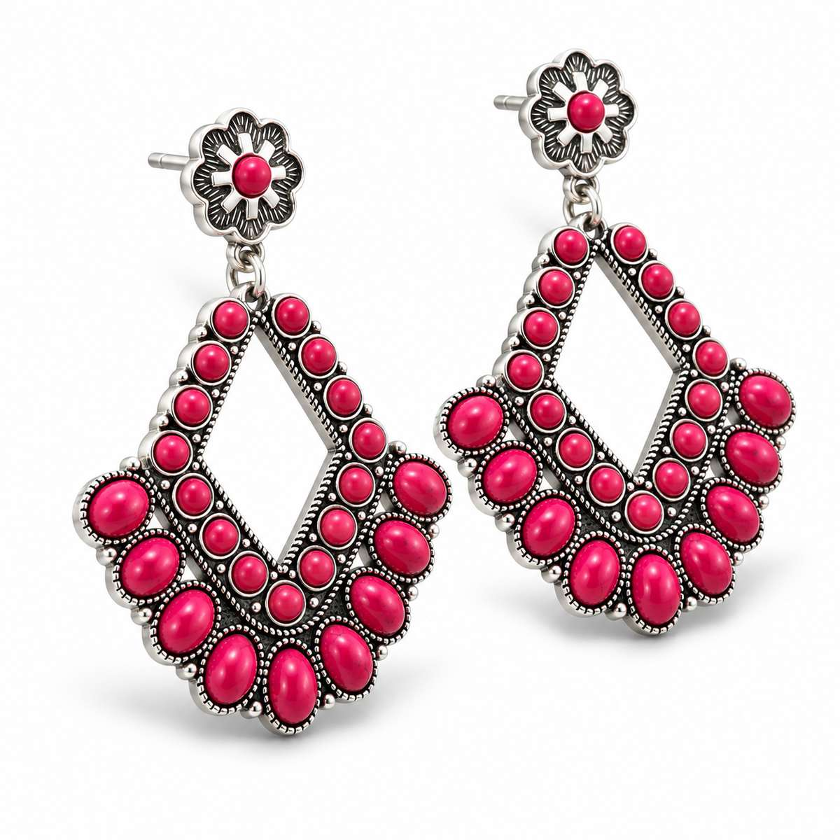 Rodeo Rose silver-tone western earrings with bright pink stones shown at an angle