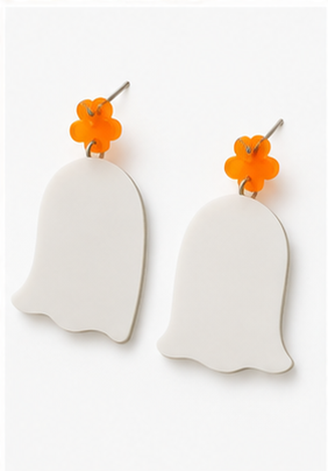 A pair of white ghost-shaped drop earrings with bright orange flower charms at the top, displayed on a clean white background.