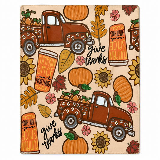 Harvest Roads & Pumpkin Spice fall throw blanket featuring vintage pickup trucks, pumpkins, sunflowers and Give Thanks lettering