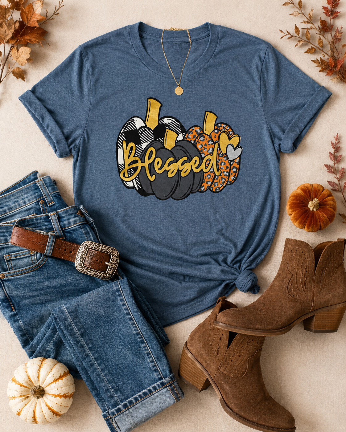 Tee with jeans, western belt, boots and subtle gold/turquoise jewelry.