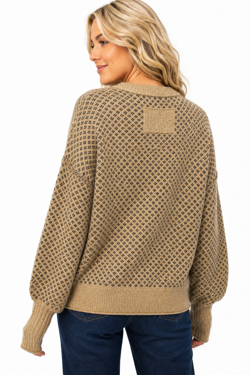 Back detail of khaki geometric sweater showing dropped shoulders, balloon sleeves, long ribbed cuffs and ribbed neckline panel.