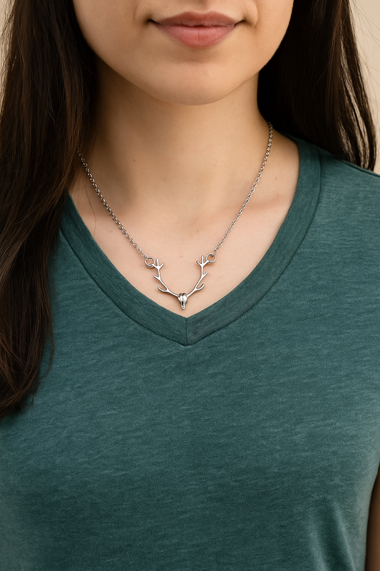 Woman wearing Oh Deer Danity Necklace with simple alloy antler pendant and chain
