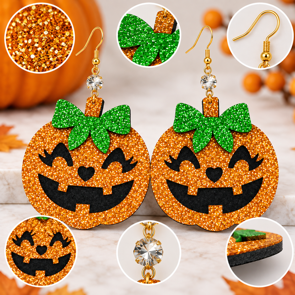 Orange glitter jack-o'-lantern dangle earrings with green glitter bows, shown on a light marble surface with pumpkin props and detail zoom circles.