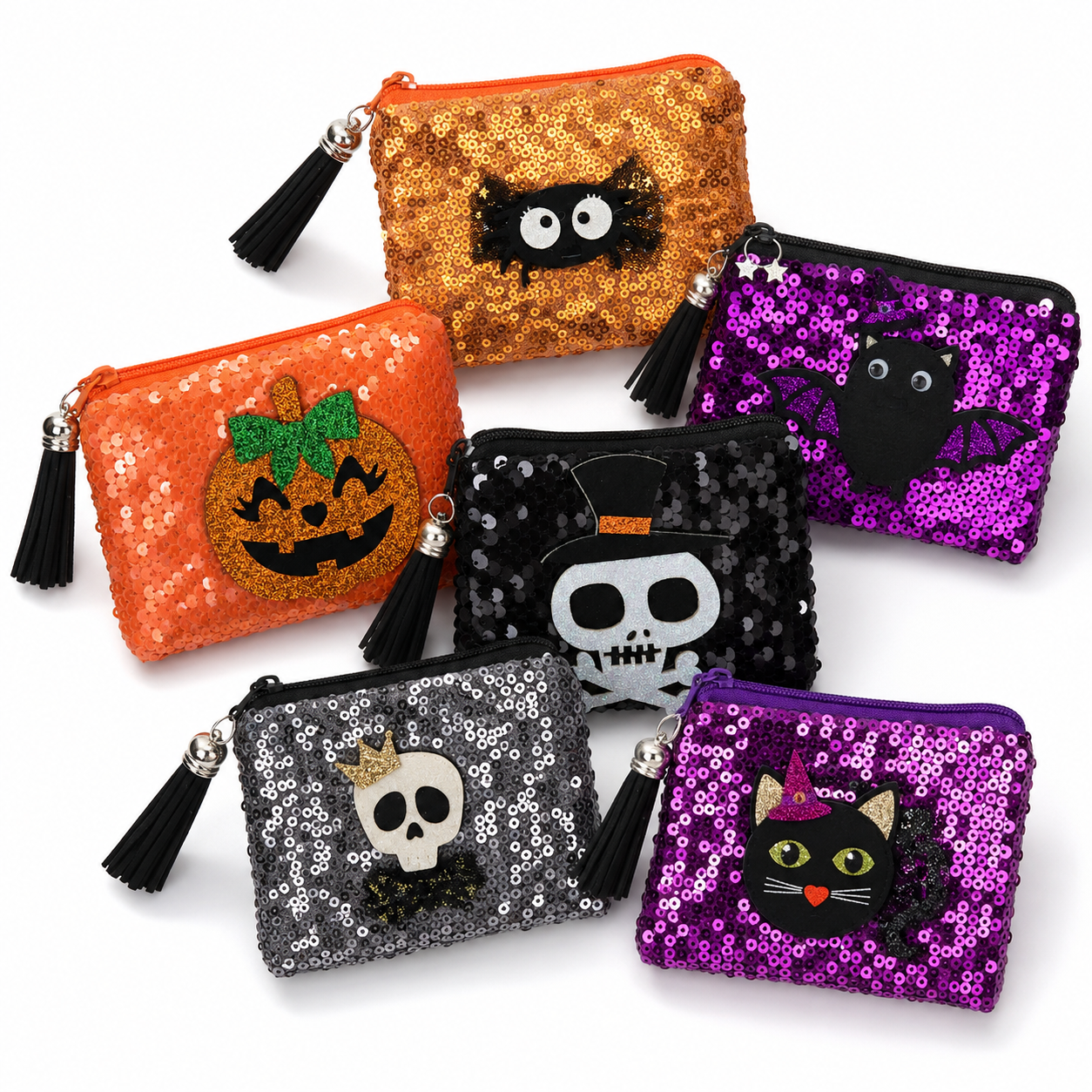 Assorted Halloween sequin coin purses with tassel keychains displayed together