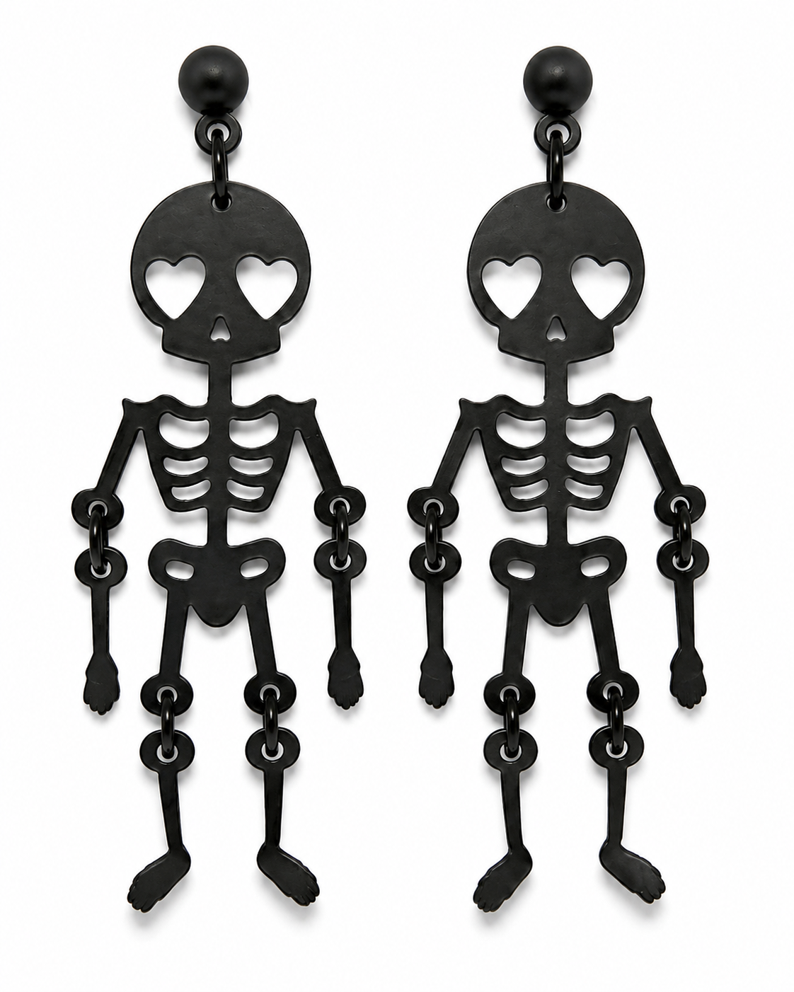 Close-up of articulated black skeleton earrings showing heart-eye skulls, rib cages and dangling limbs