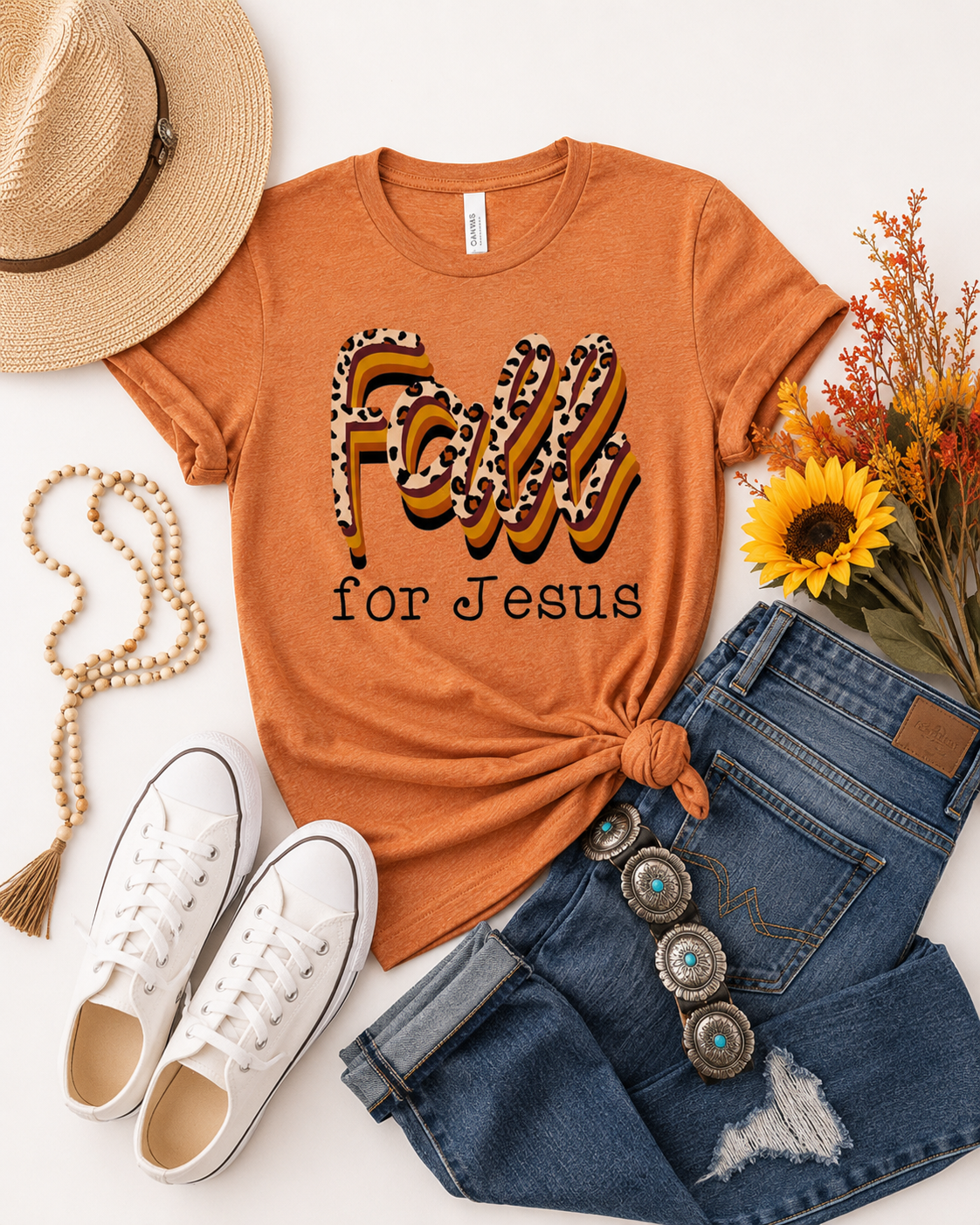Tee styled with denim, cognac leather, turquoise jewelry and warm fall textures