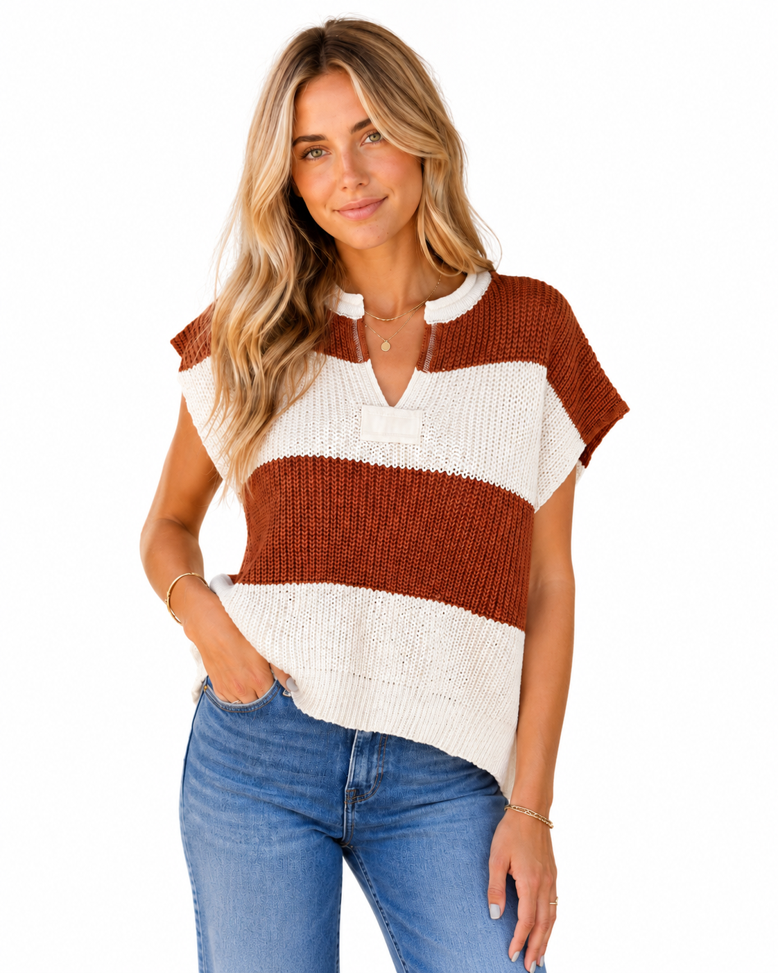Saddle Stripe V-Neck Knit Sweater in brown and ivory styled with medium-wash jeans on a white background.