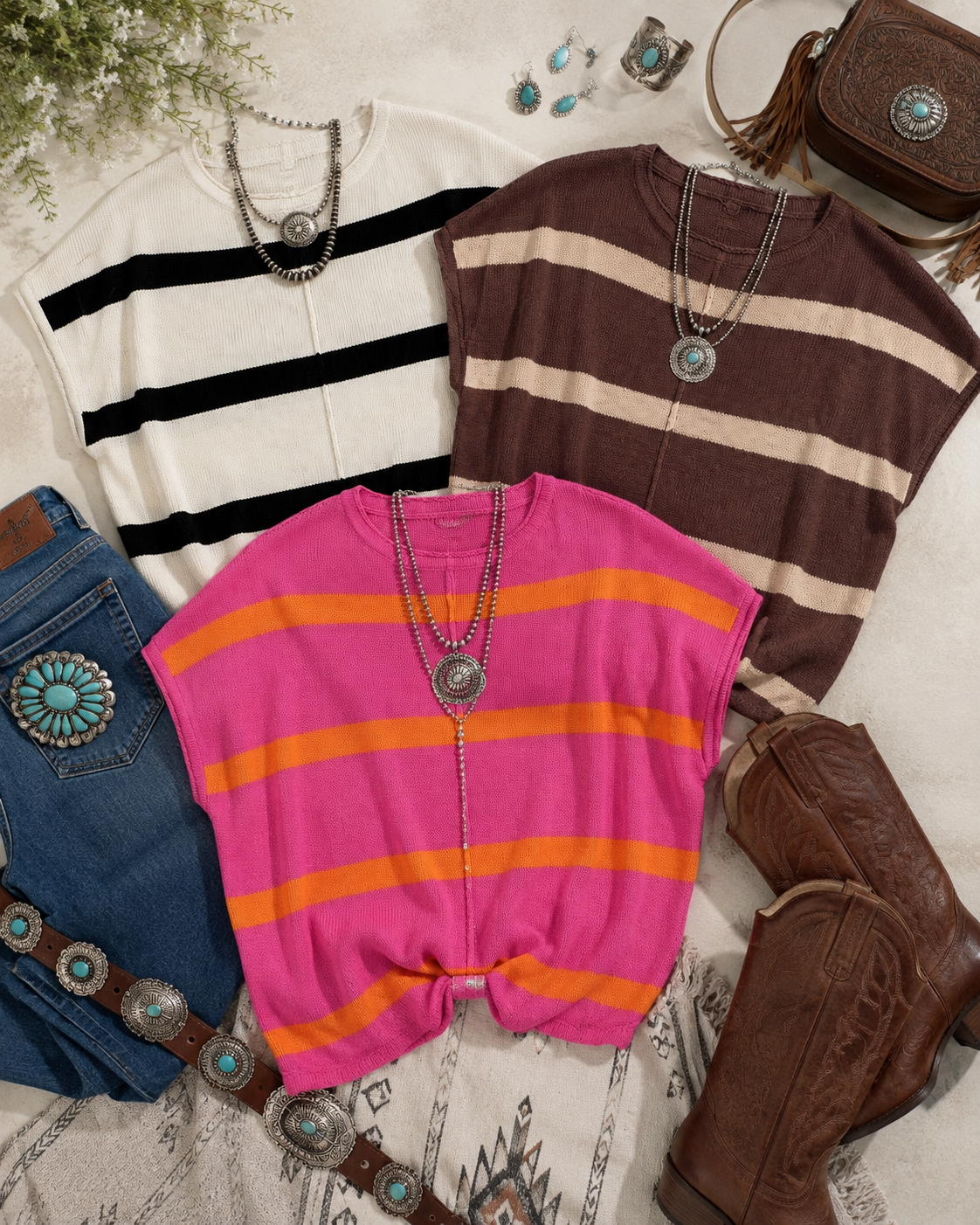 Flat lay showing all three Saddle Stripe Knit Sweater Tee color options styled with denim, belts, boots, and simple jewelry.
