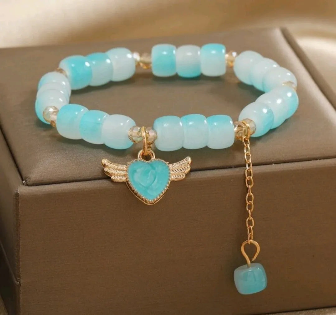 Carried By Wings Blue Stretch Bracelet