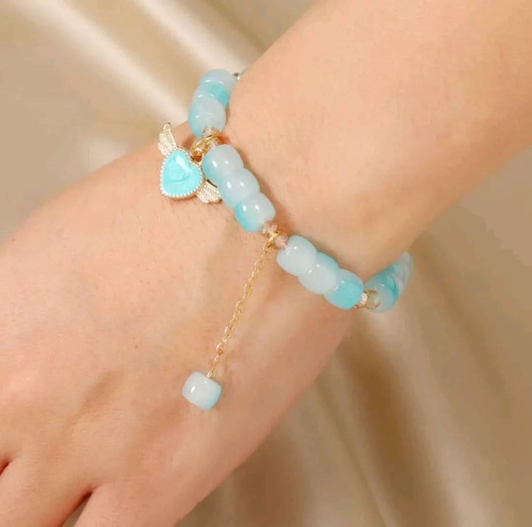 Carried By Wings Blue Stretch Bracelet