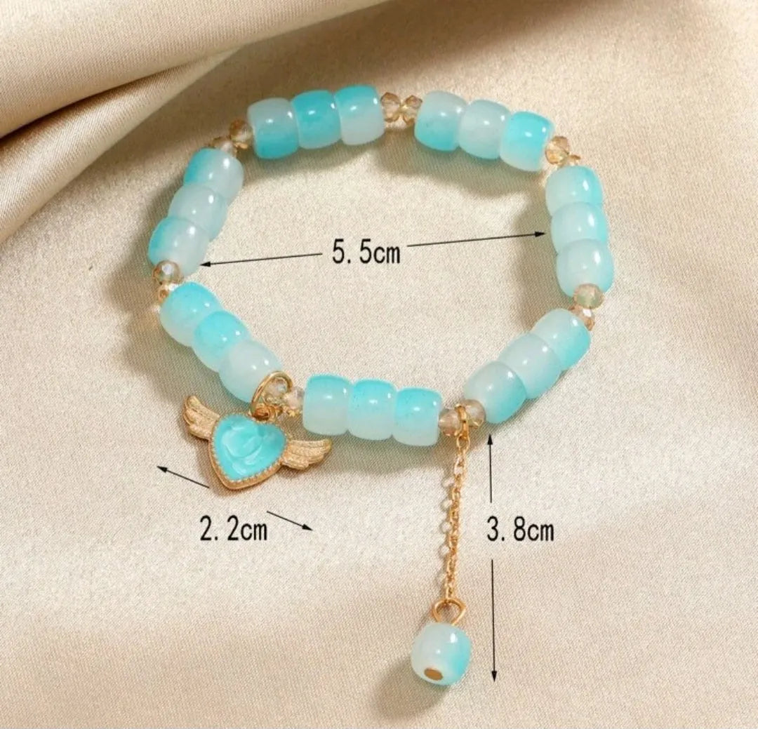 Carried By Wings Blue Stretch Bracelet