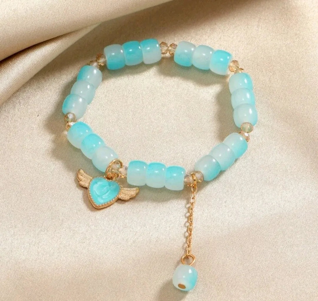 Carried By Wings Blue Stretch Bracelet